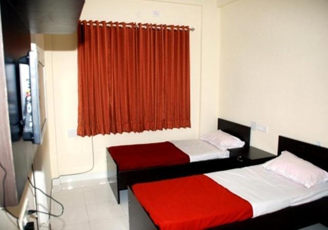 Maple Inn Budget Hotel بنغالور الغرفة الصورة
